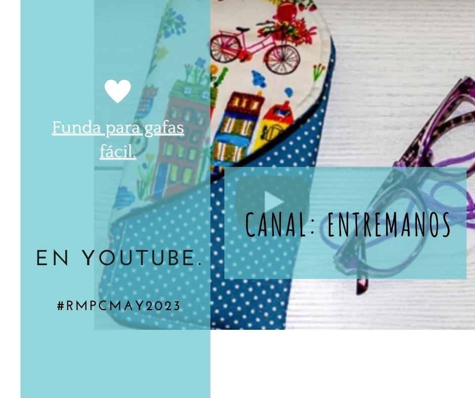 Imagen de fondo de la funda de gafas con solapa en forma de corazón del canal Entremanos. En la parte izquierda del cartel, superpuesto a ese fondo aparece un rectańgulo vertical en color verde turquesa con transparencia. Sobre él se lee el texto: 